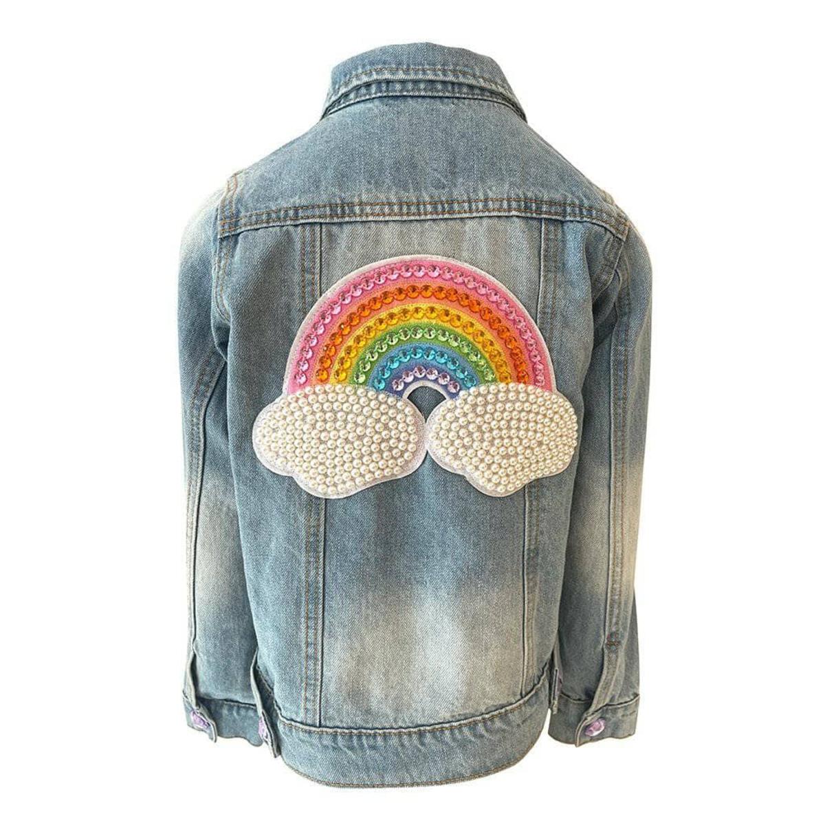 Lola + The Boys. Turn heads with this one-of-a-kind Rainbow Pearl Denim Jacket! With a light denim wash and detailed with a rainbow pearl patch on the back and rainbow buttons, this jacket will add some serious color and pizazz to any outfit. So don your outfit with the perfect jacket and make a statement!