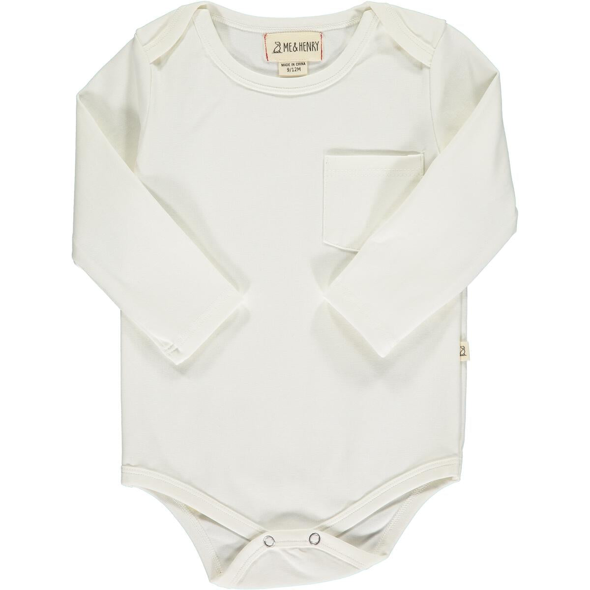 Off White Long Sleeve Pocket Basic. Sizes 0-3 Months through 9-12 Months onesie style. Button snap closure. Sizes 12-18 Months + 18=24 Months shirt style. 100% Cotton.