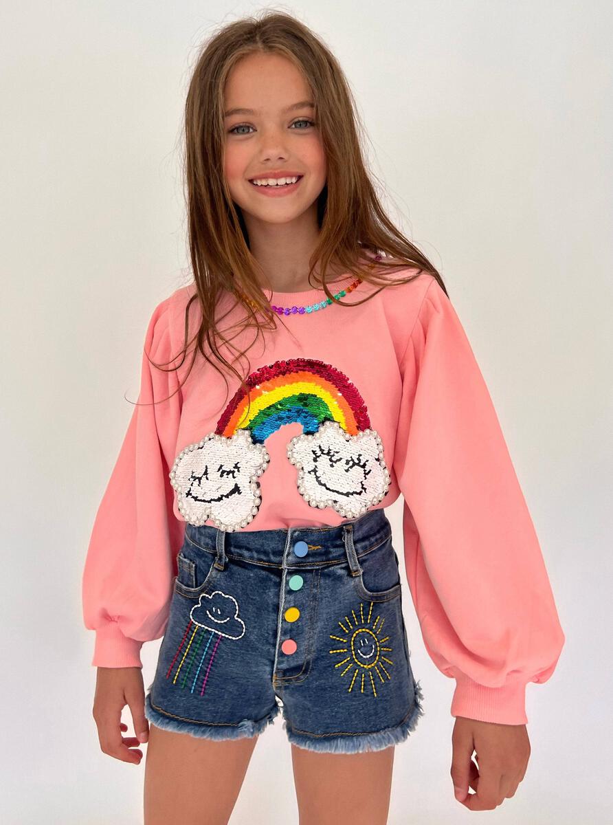 Lola + The Boys. For your aspiring fashionista, the Lola + The Boys Puff Sleeve Happy Rainbow Sweatshirt is a must-have! Featuring a dreamy pink crewneck adorned with pearls and a fun happy rainbow patch, this top adds just the right amount of playful panache to any outfit.