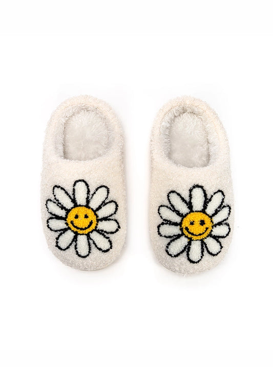 Our cozy Happy Daisy Slippers are super soft and keep your feet warm! Made with nonslip rubber bottoms for worn indoor or outdoor use. Match with Mom in our Adult Happy Daisy Slippers!   Little Kid fits kid's shoe size 9-12. Big Kid fits kid's shoe size 1-3. 