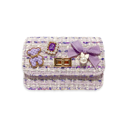 Lilac Teddy Charms Tweed Purse with Gold Chain Strap and Toggle Lock Closure.  Dimensions: 5-1/2" Length x 3-3/4" Height x 2-1/4" Width.