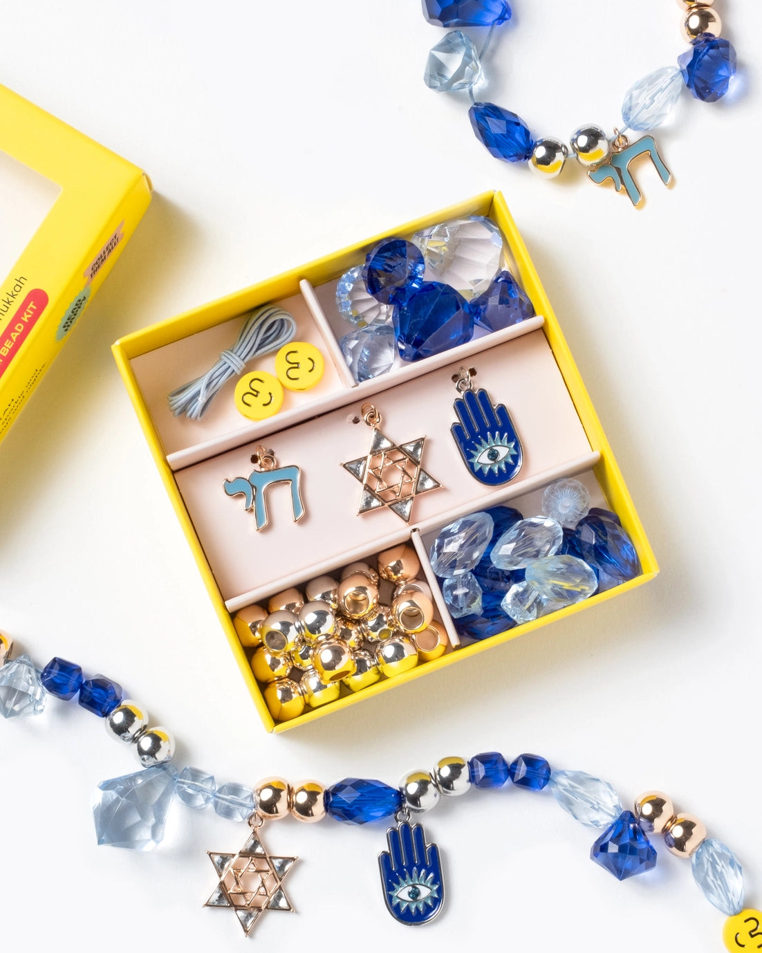 It's time to celebrate with the Make It Hanukkah Mini Bead Kit! It's the perfect way to show your holiday spirit this season – with beads and charms overflowing with extra special meanings. Charms included symbolize life and the good things to come, and for hope, peace and protection. Small parts, not intended for children under 3 years.
