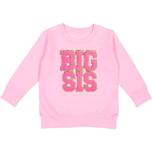 This Sweet Wink Big Sis Patch Sweatshirt is a fun and cute sweatshirt for any big sister! Features pink crewneck with pink chenille patch letters. Tagless inside neck label for itch-free wear. Toddler Unisex fit. Each sweatshirt is hand pressed with love.  60% Cotton, 40% Polyester Fleece.  Machine washable; wash inside out, lay flat to dry.   Women owned, mama owned. 