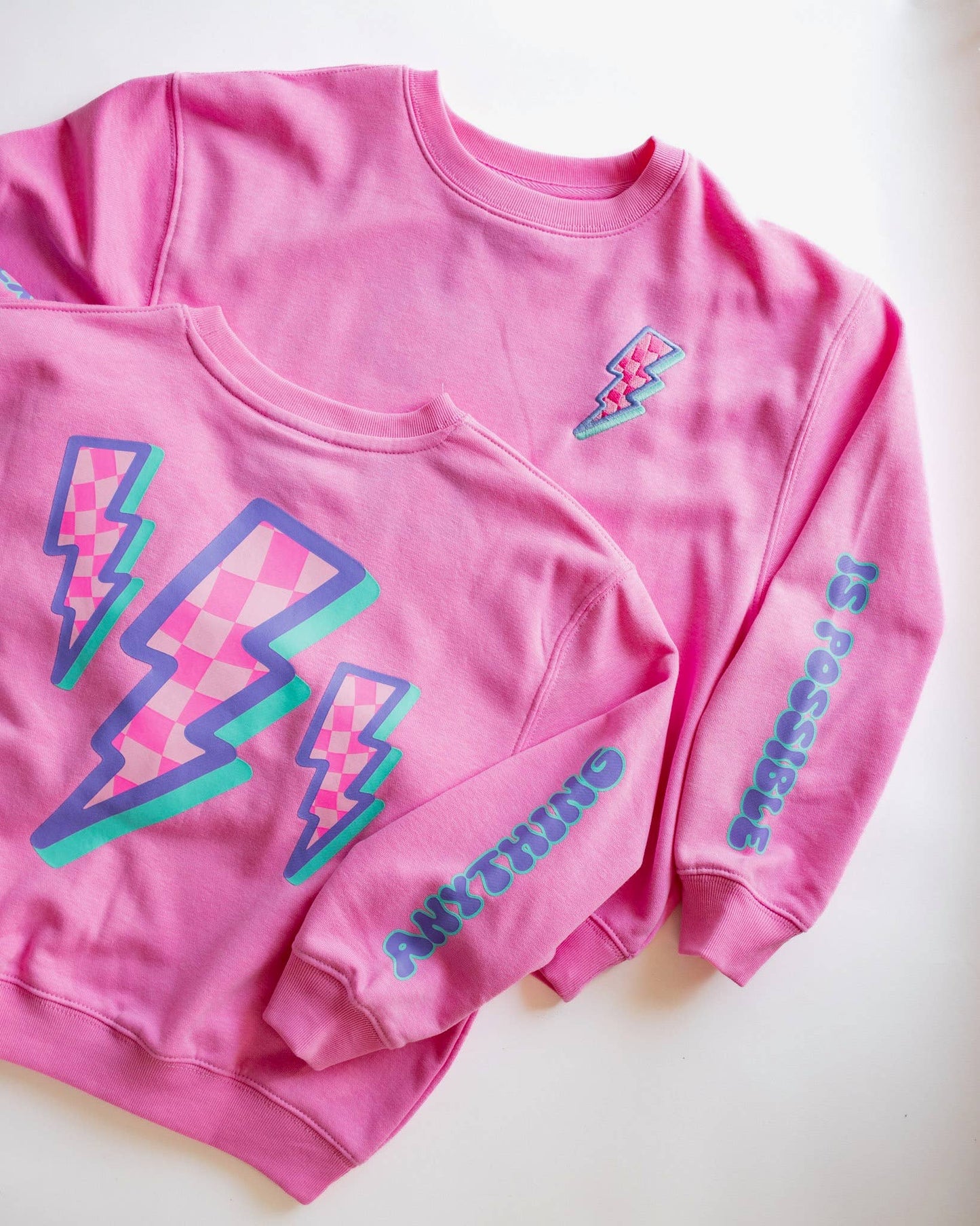 Anything is Possible Lightning Sweatshirt in Berry