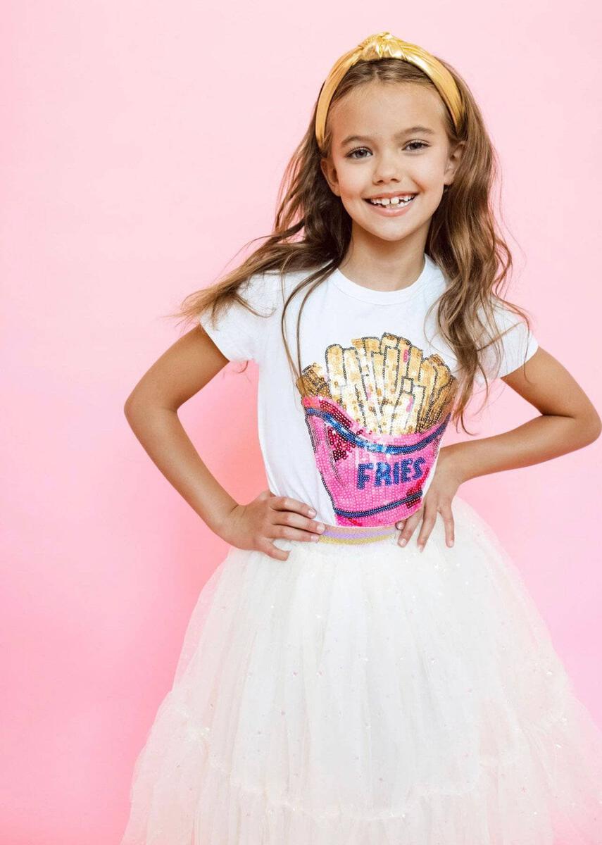 Lola + The Boys. Look no further for comfy, cool style! This Lola + The Boys French Fries Sequin T-Shirt is sure to be your little one's newest wardrobe staple. With its super soft fabric and fun, shimmery sequin french fries patch, it's the perfect everyday piece you'll both love to show off. 