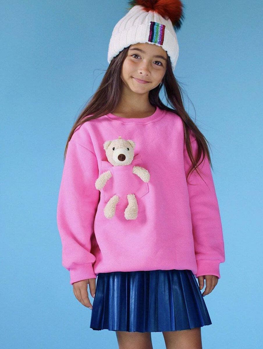 Stay cute in this Lola + The Boys Teddy Buddy Bear Crewneck! Features a lightweight crew neck top with teddy bear in a front pocket.    100% Cotton. Machine washable. Tumble dry low. 