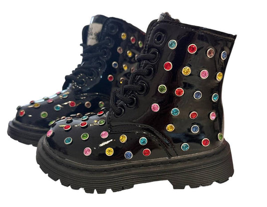 Step up your shoe game with these Lola + The Boys Rainbow Crystal Boots! High top combat style lined with fur, these standout stunners are bedazzled with colorful crystals that guarantee to bring a pop of sparkle to your look. Super comfy and totally on trend, you won't want to miss these boots! Shine like a rainbow every day!  Runs small; if between sizes recommended to size up. 