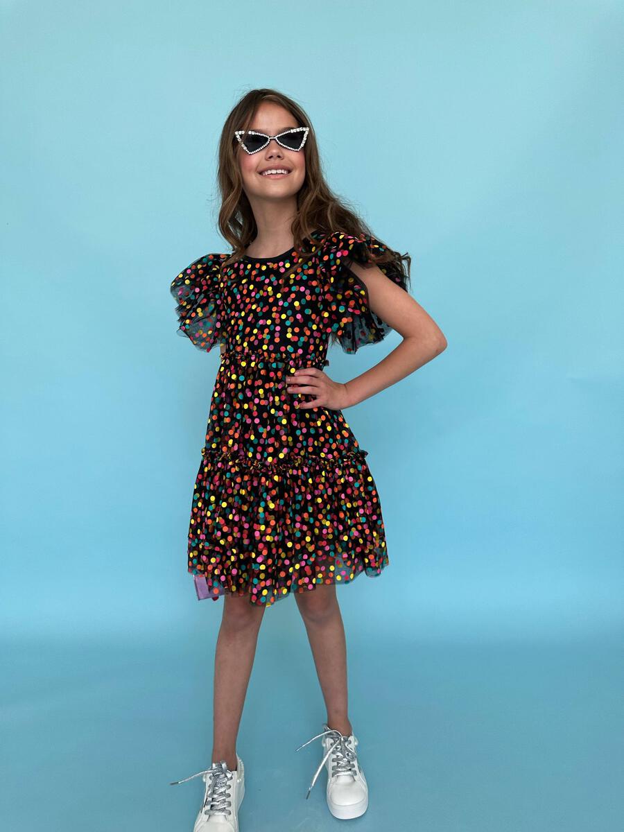 Bring surprise and sparkle to your girl's wardrobe with this cute Lola + The Boys Black Funfetti Surprise Dress! Puffy sleeves and covered in colorful confetti, they'll feel like a star every time they wear it! Perfect for special occasions or just for fun, it's an instant hit!