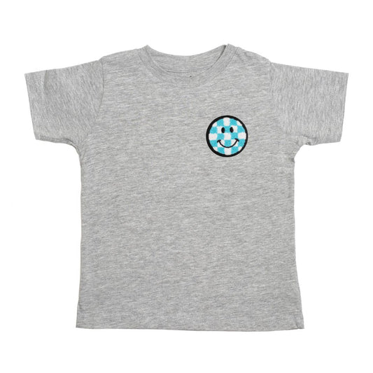 The Sweet Wink Smiley Checker Patch Tee is a fun and handsome t-shirt for kids to welcome Spring! Heather gray shirt with blue, white, black chenille patch. Tagless inside neck label for an itch-free wear. Fits true to size; Toddler Unisex. Each t-shirt is hand pressed with love using baby and child safe inks.  Machine washable, lay flat to dry.  90% Cotton, 10% Polyester.  Women owned + designed by a Mother/Daughter duo in NYC.