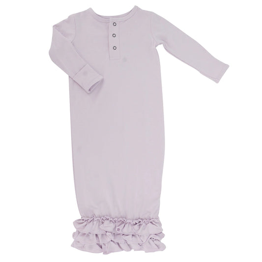 Bring your little one home in this sweet buttery soft receiving gown! Ruffle bottom for easy access. Made with love in a signature bamboo fabric!  Safe for sensitive skin. Tagless label for total comfort.  Machine washable and dryable!  95% Viscose from Bamboo 5% Spandex