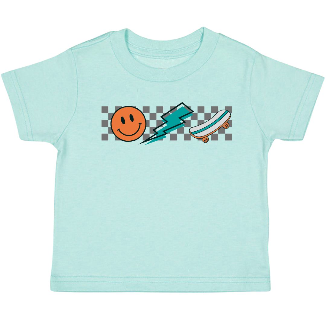 The Sweet Wink Happy Skater Dude Tee is a fun and handsome t-shirt for kids to welcome Spring! Aqua shirt with multicolor graphic. Tagless inside neck label for an itch-free wear. Fits true to size; Toddler Unisex. Each t-shirt is hand pressed with love using baby and child safe inks.  Machine washable, tumble dry low.  100% Cotton.   Women owned + designed by a Mother/Daughter duo in NYC.