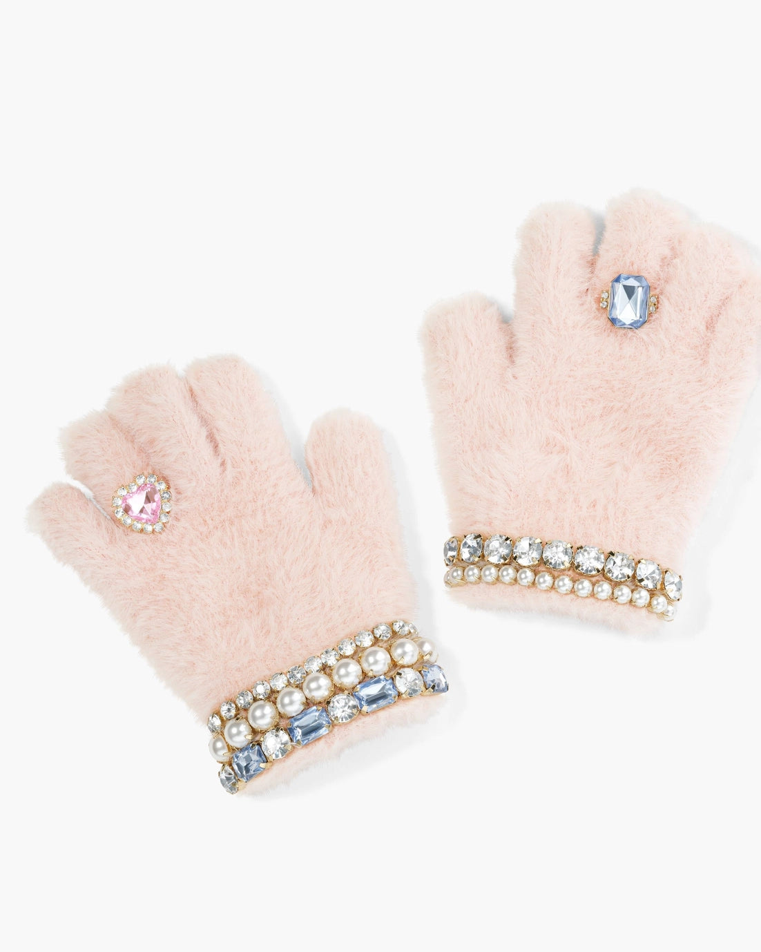 Keep your cutie's hands warm and their style on point with these pink Cotton Candy Jeweled Gloves! Adorned with gem and pearl beads to look like rings and bracelets, these super soft gloves provide a stretchy, cozy fit so kids can keep up their glam game all winter long. A must-have accessory - perfect for ages 4 through 10!