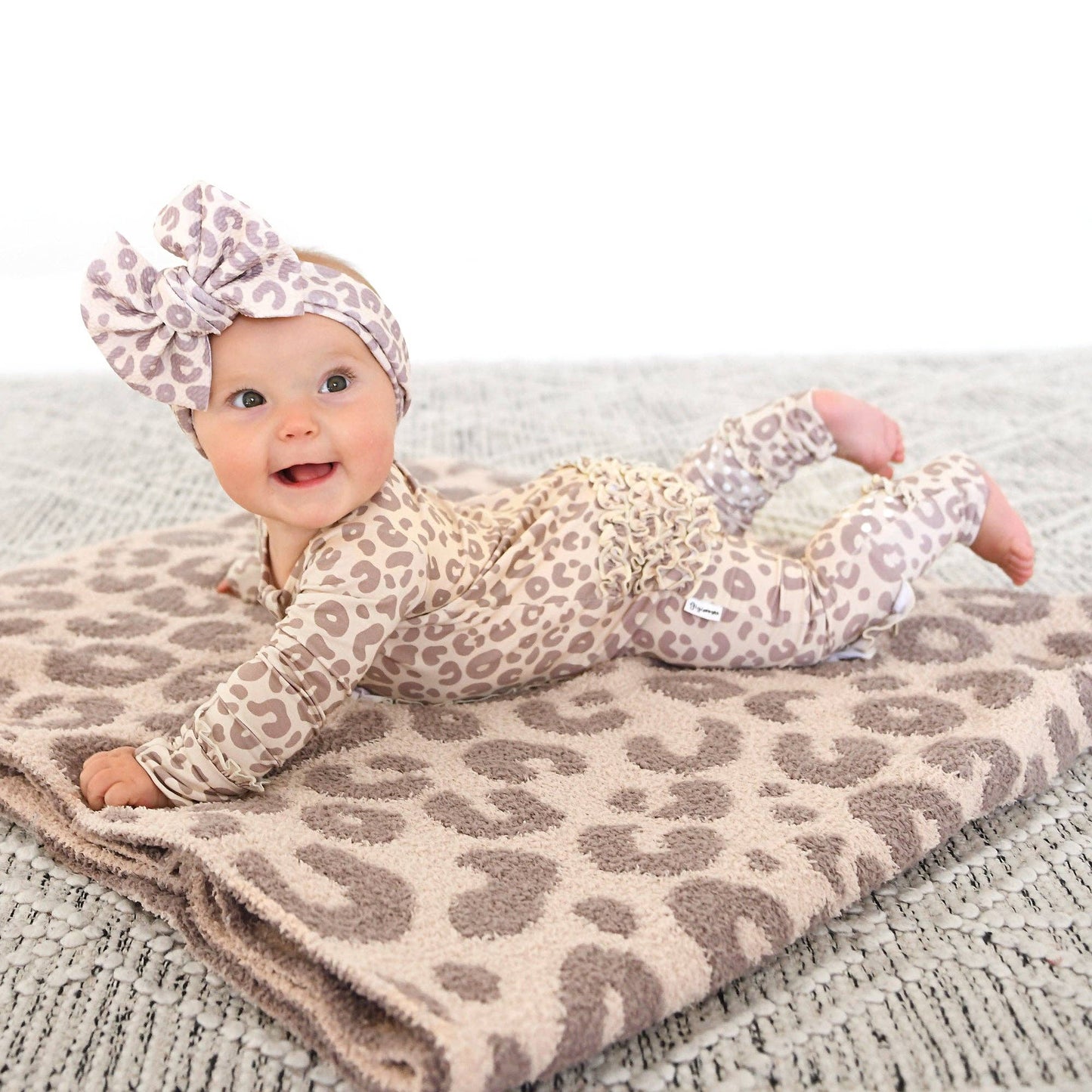 Amari Leopard Ruffle Bamboo Zip Romper