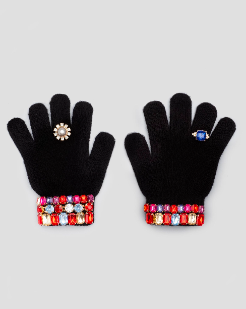 Keep your cutie's hands warm and their style on point with these Ice Skating Jeweled Gloves! Adorned with gem and pearl beads to look like rings and bracelets, these super soft gloves provide a stretchy, cozy fit so kids can keep up their glam game all winter long. A must-have accessory - perfect for ages 4 through 10!

*Small parts, not intended for children under 3 years.