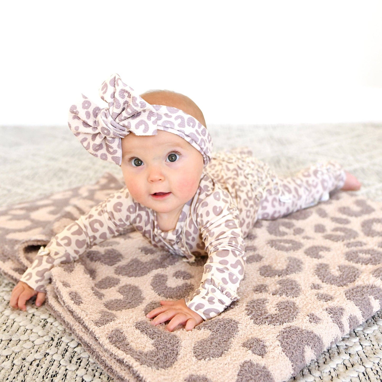 Amari Leopard Ruffle Bamboo Zip Romper