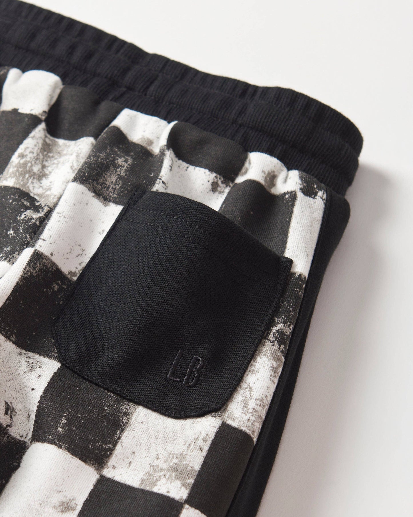 Black + White Checkered Sweatpants