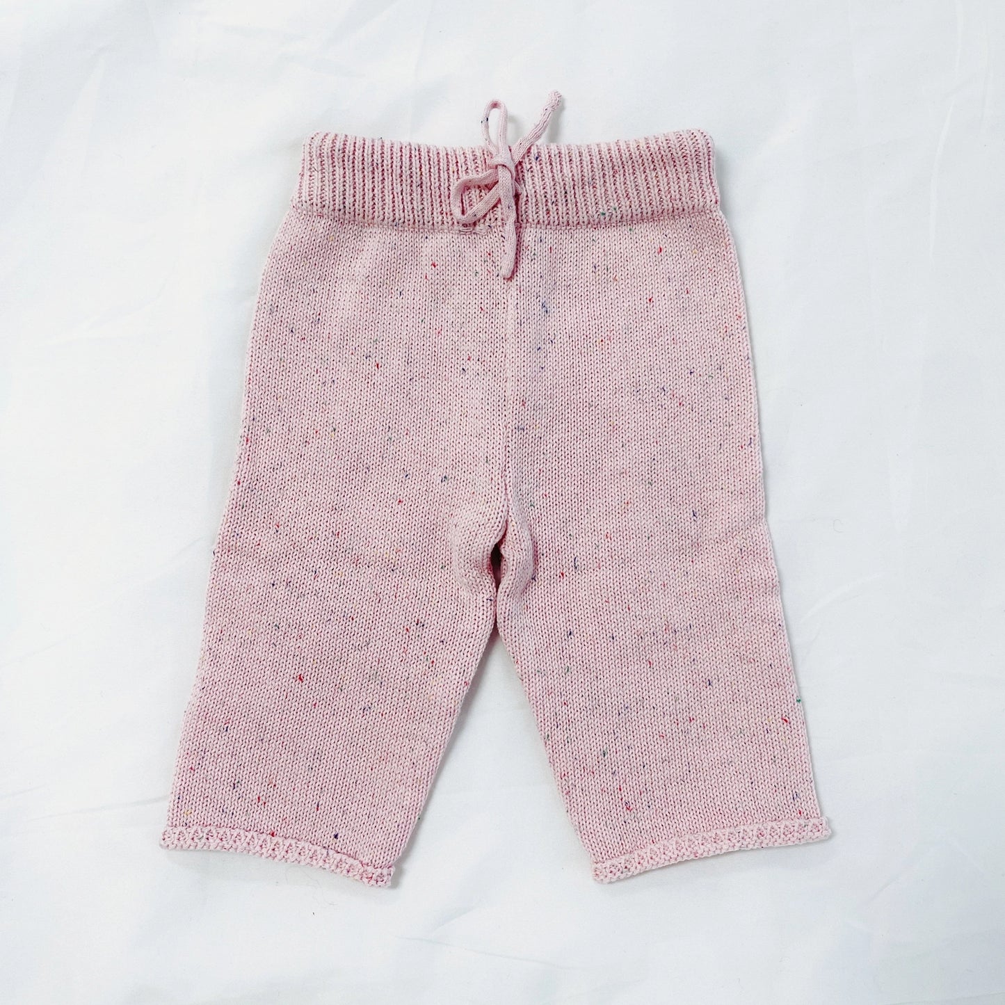 Stay cozy in these Strawberry Charlie Knit Pant! Features a sprinkled knit, wide-leg cut with elastic waist and drawstring. Style with our Strawberry Charlie Knit Pullover!   100% Cotton.  Wash cold with similar colors; lay flat to dry.   Women owned.