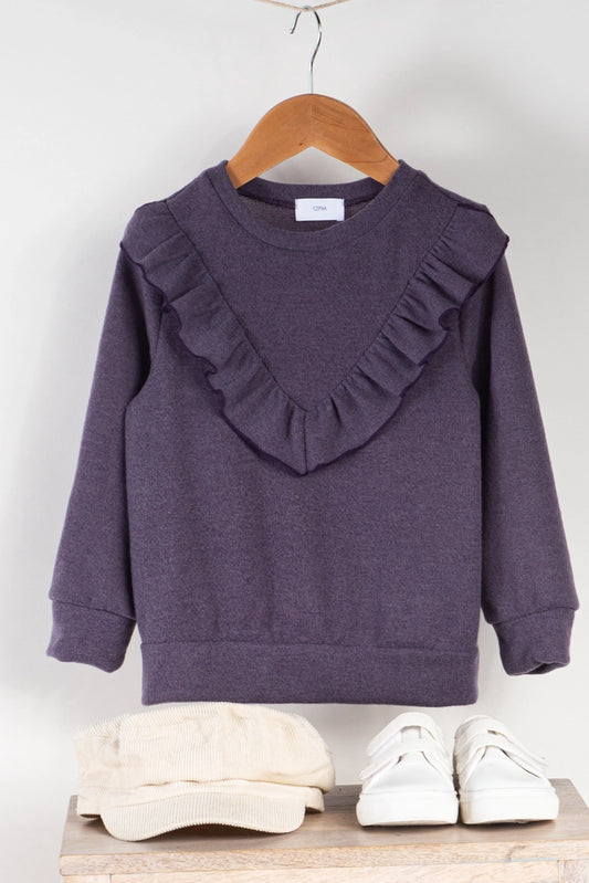 Show off a bit of flair in this Eggplant Ruffle Front Long Sleeve Top! Features a crewneck, and ruffle detail. A playful pop to your little's look!  Women owned.