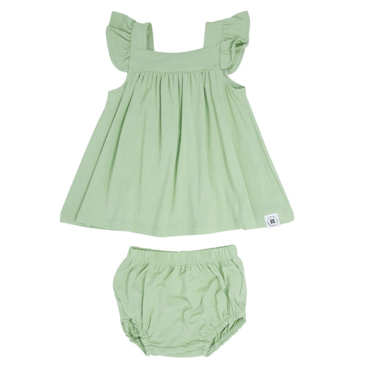 <p>This two-piece dress set is perfectly styled and oh so comfy! Features a sweet ruffle dress with matching bloomers to complete the look. Snaps on back. <span data-mce-fragment="1">Made with our signature bamboo fabric and finished with a tagless, silk screen label for total comfort!</span></p> <p data-mce-fragment="1">Machine washable and dryable.</p> <p data-mce-fragment="1">95% Viscose from Bamboo 5% Spandex.</p>