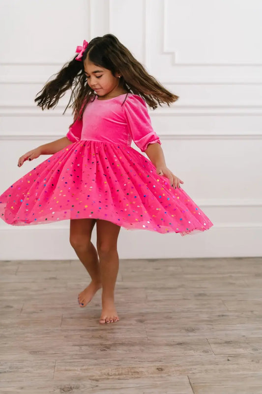 The Diana Dress in Confetti Pop is the perfect look for any special occasion! Features a scoop back velvet bodice with 3/4 sleeves over lined tulle skirt with confetti style embellishments. Our confetti tulle skirt is so fun and colorful - great for birthdays, dress-up, holidays, or just being fancy around the house!